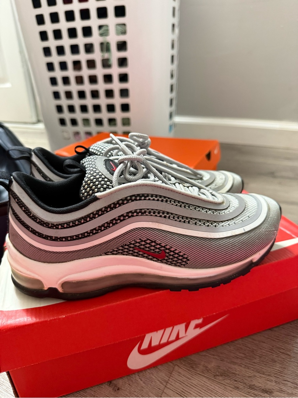 Nike Women’s Silver and Black Sneakers with Red Swoosh